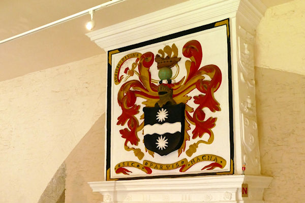 Buckland Abbey Drake's coat  of arms above fireplace in former north transept arch - Tim Edmonds