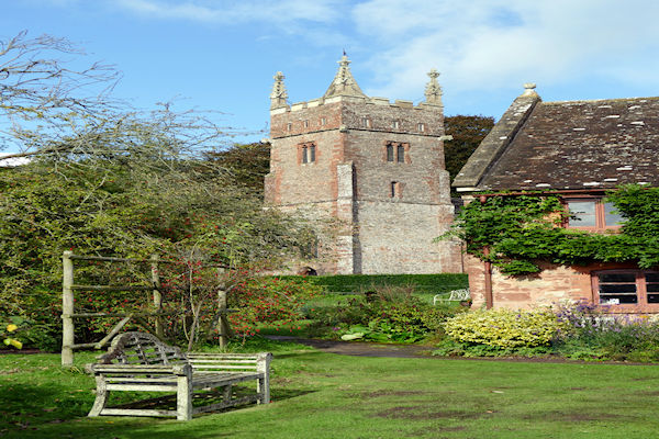 Cothelstone church tower from  lawn in front of cottages. - Tim Edmonds