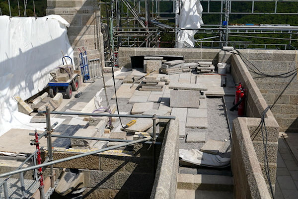 Castle Drogo work in progress on roof showing  membrane granite chips and slabs - Tim Edmonds