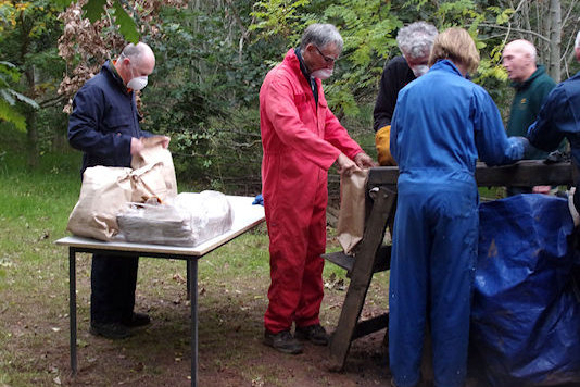 Bagging the charcoal -  David Beach