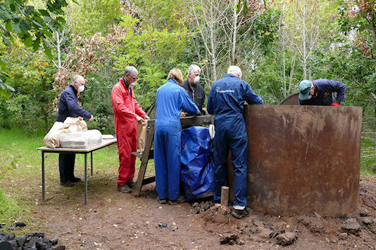 Unloading, sorting and bagging the charcoal - Tim Edmonds